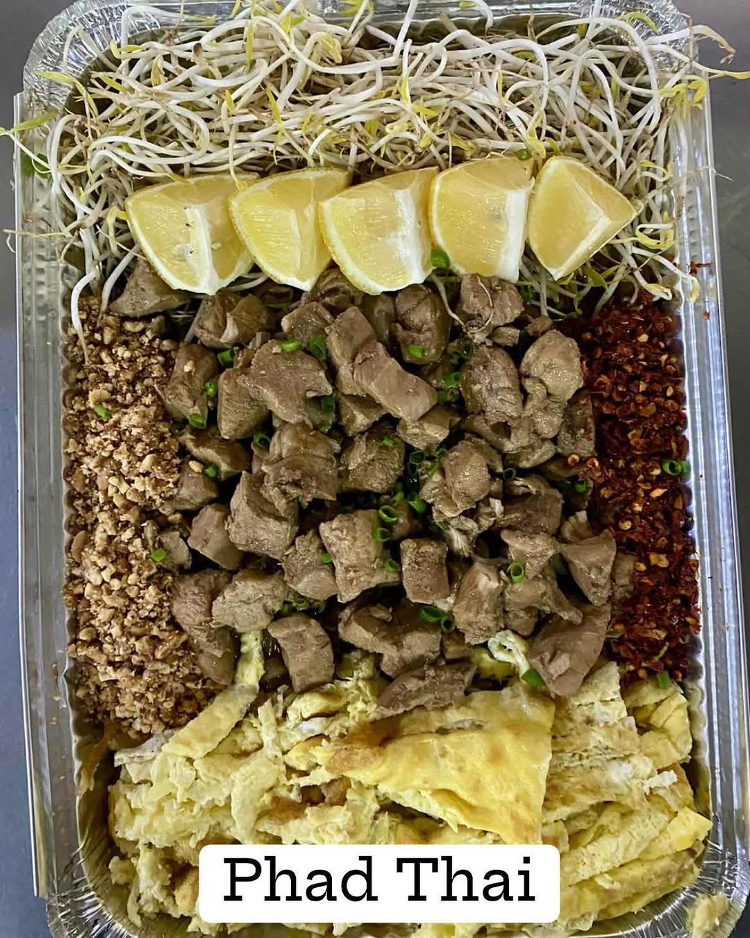 Customer order — Phad Thai party tray ready for delivery