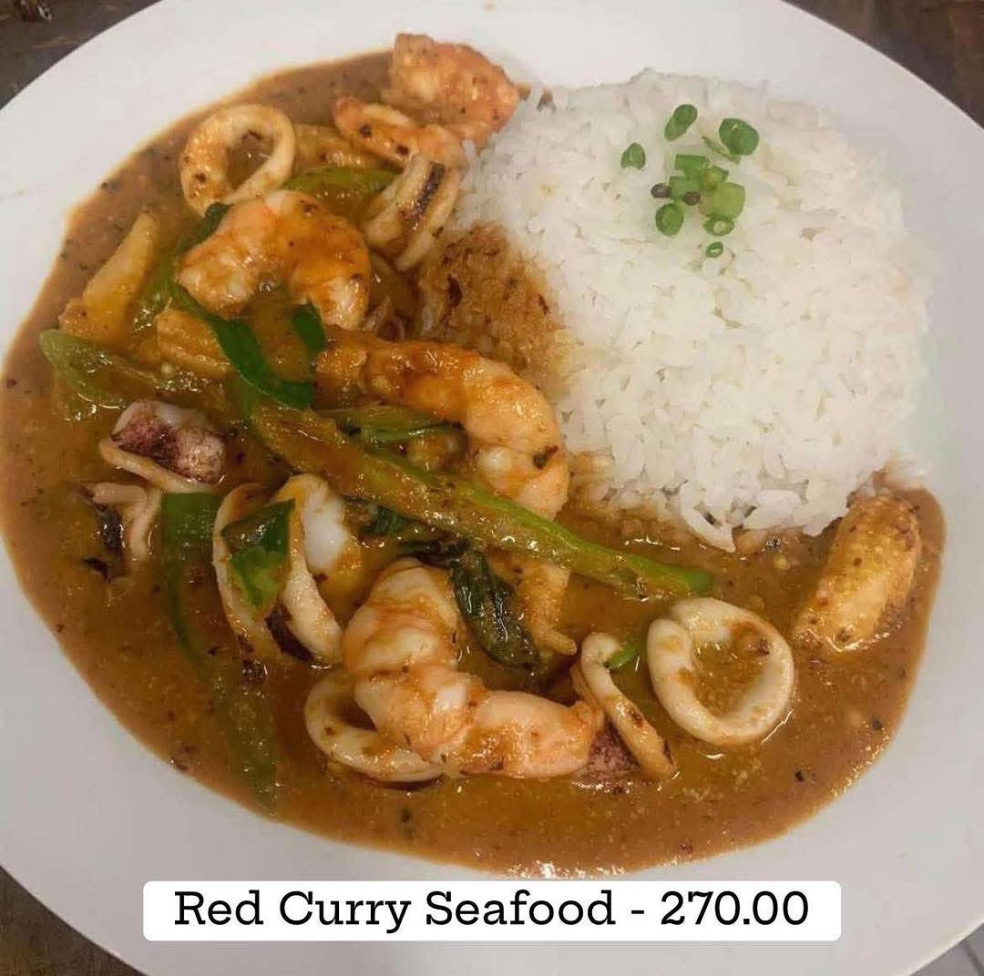 Thai stir-fry dish — colourful vegetables and seafood